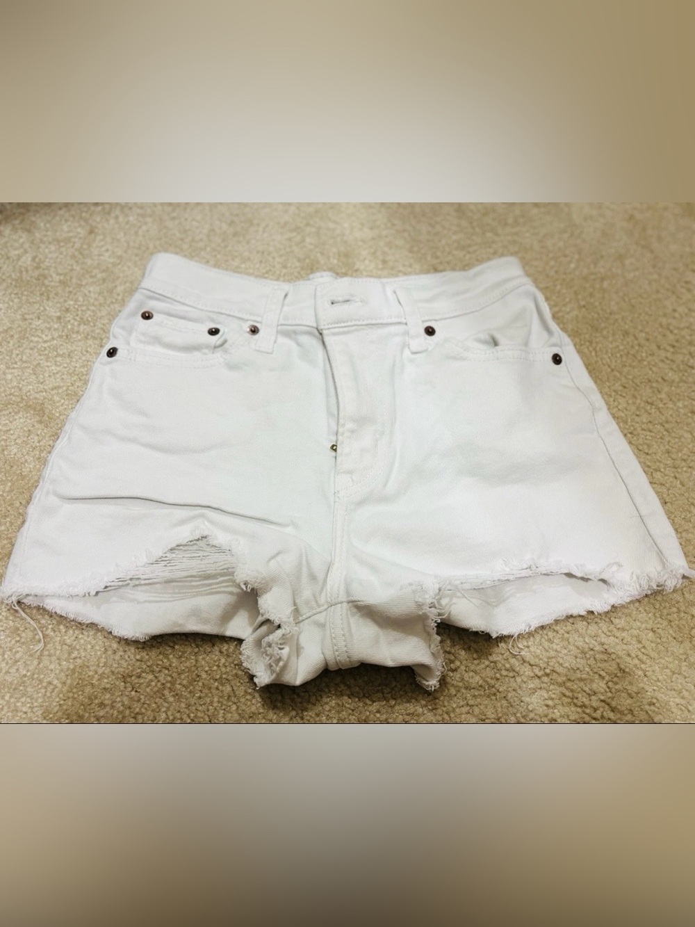 Levi’s Women’s High Rise Denim Cut Off White Jean Shorts